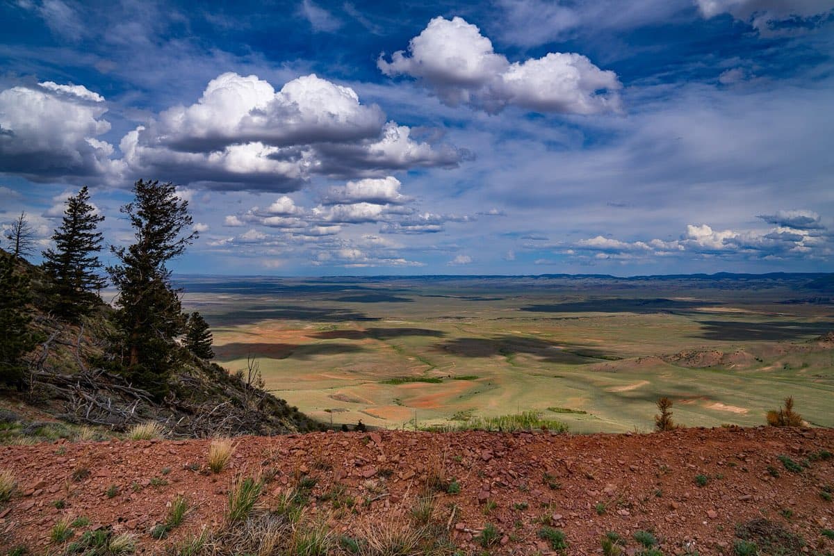 Open high plains beneath broad clouds near Jelm Mountain southwest of Laramie, Wyoming.