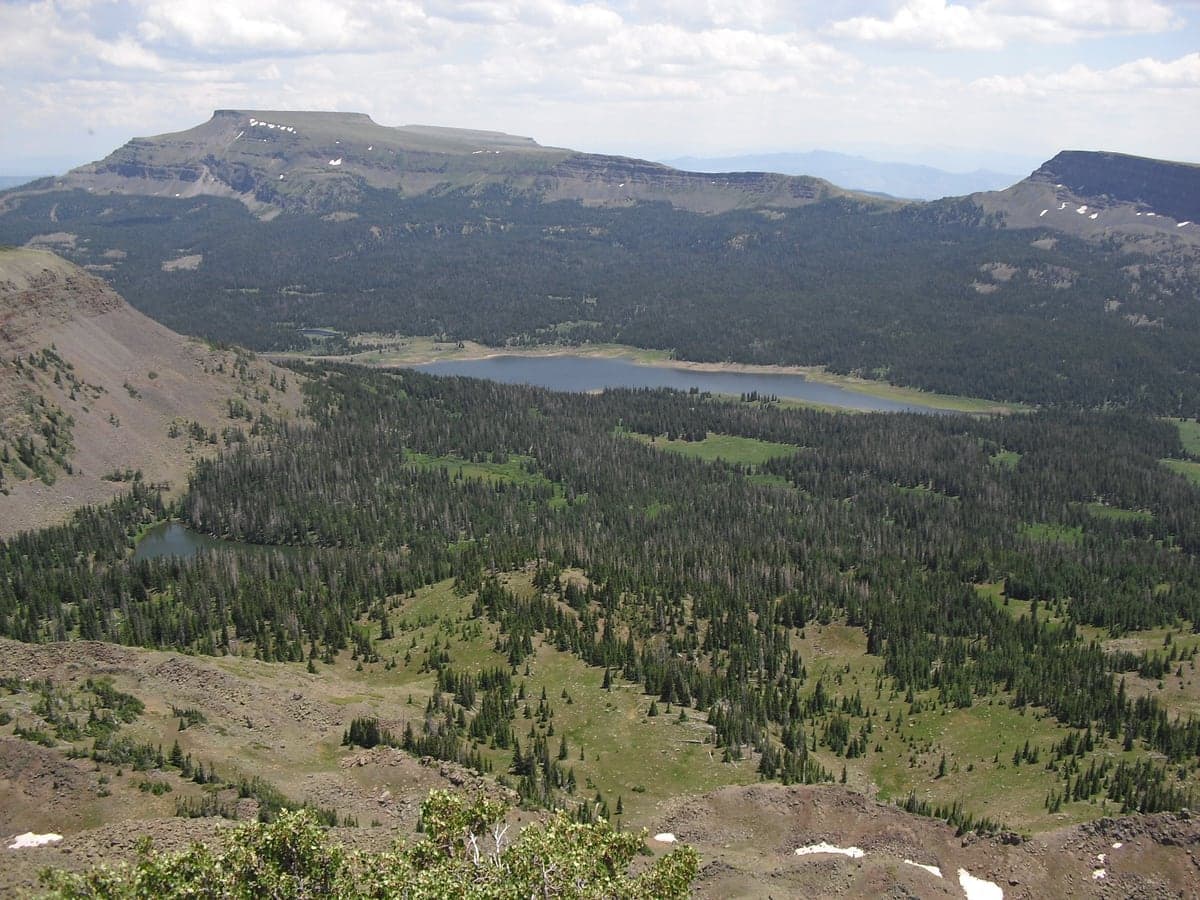 Stillwater Reservoir below the broad cliffs and high plateau of Flat Top Mountain