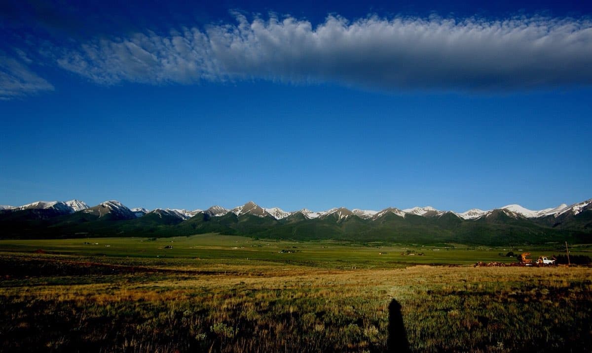 Morning clouds brush the Sangre de Cristo crest above the Wet Mountain Valley near Westcliffe.