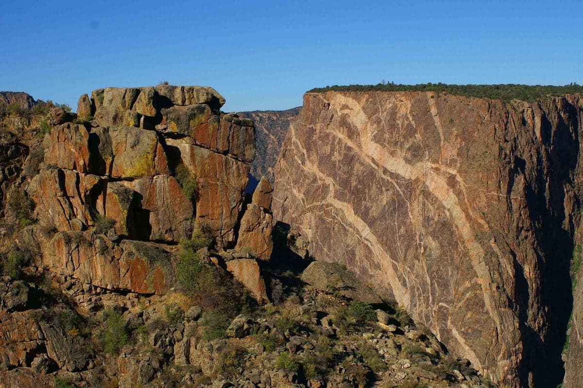 Soft light crossing the sheer Painted Wall in Black Canyon of the Gunnison.