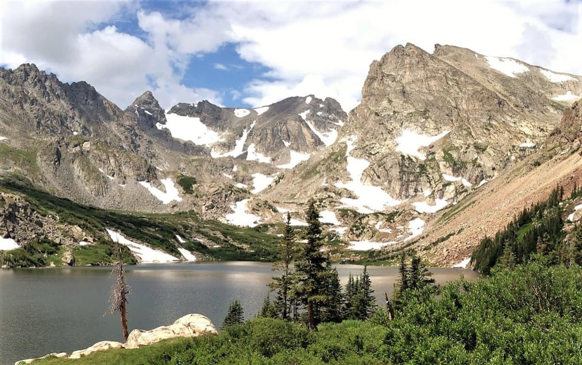 Navajo, Apache, and Shoshoni peaks above Lake Isabelle in the Indian Peaks Wilderness.