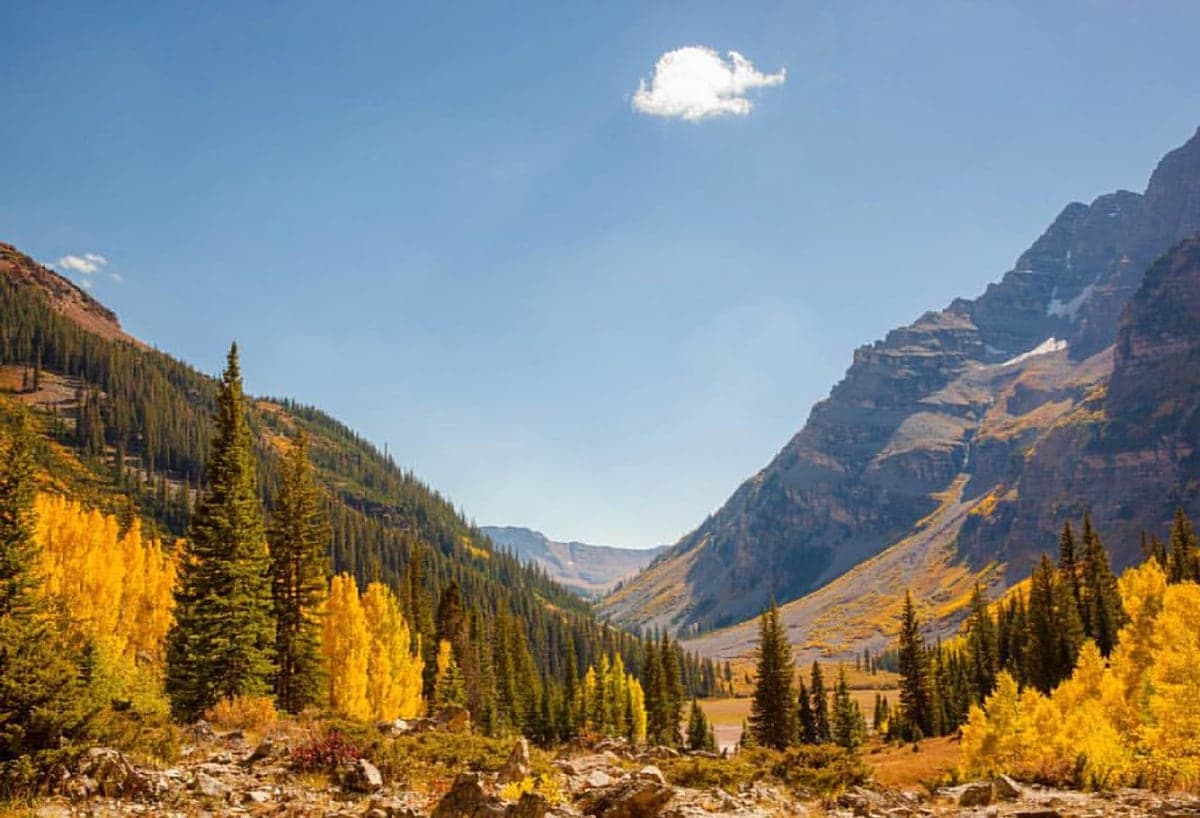 Golden aspens above the Maroon Creek valley in the Aspen, Maroon Bells & Roaring Fork region.