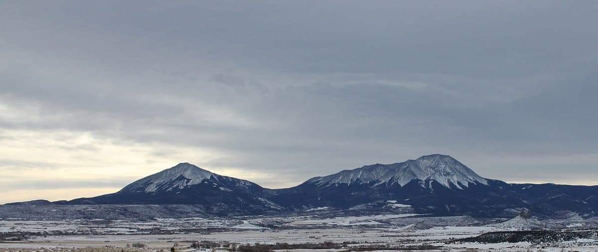 The twin Spanish Peaks rise above the broad grassland of southern Colorado.