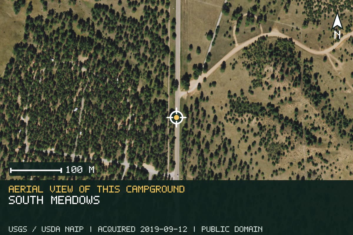 Aerial view of South Meadows, with the verified campground location marked.