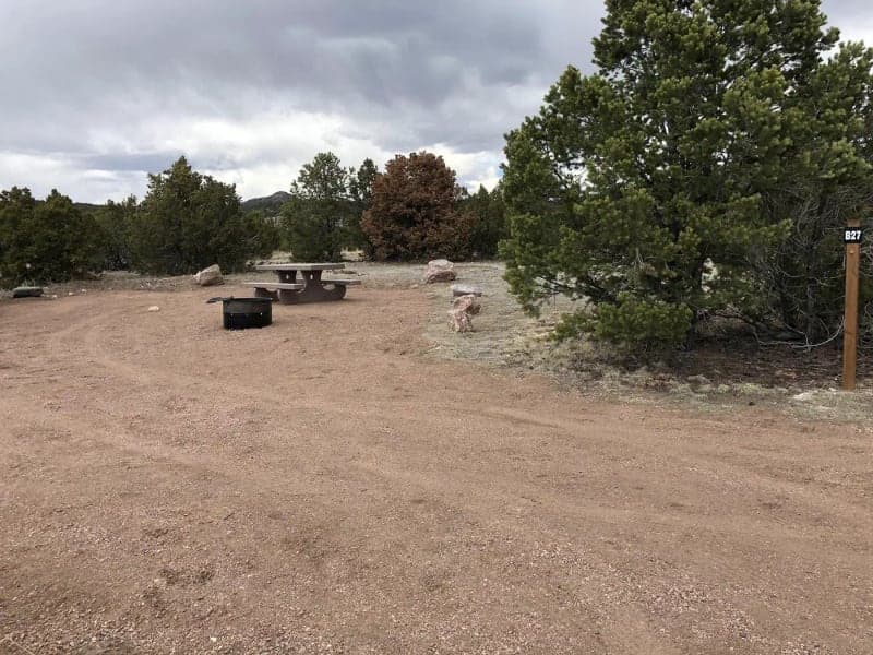 Picnic table and fire ring at Site B-27 in The Bank Campground