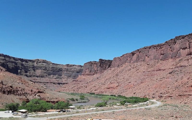 Big Bend and Upper Big Bend campgrounds along the Colorado River beneath red cliffs